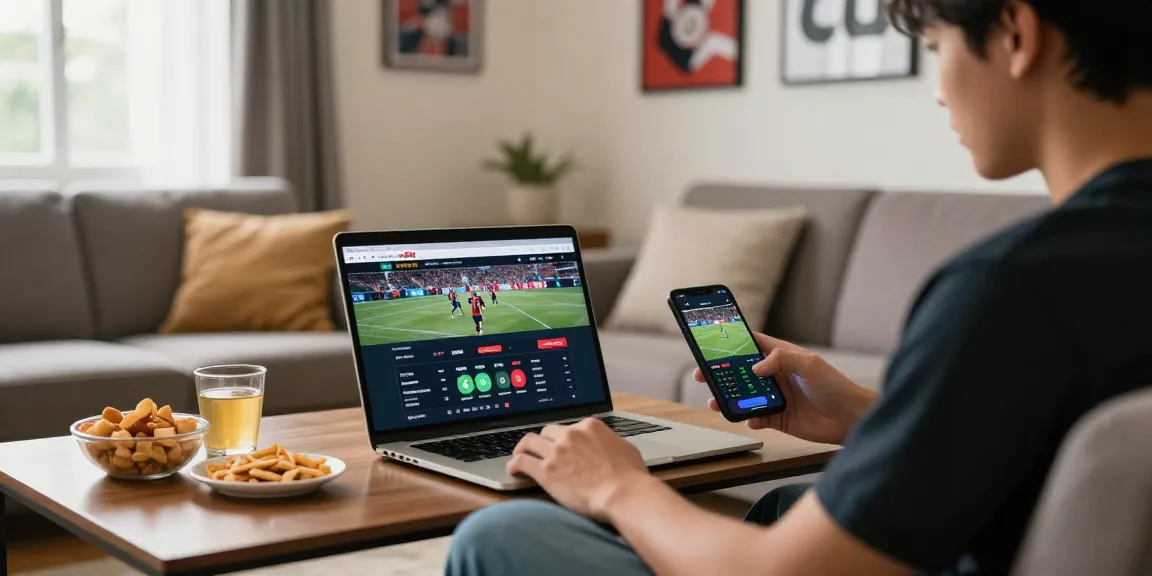 A young adult engaged in sports betting on Fun88Thailand, showcasing a cozy home environment with snacks and a laptop.